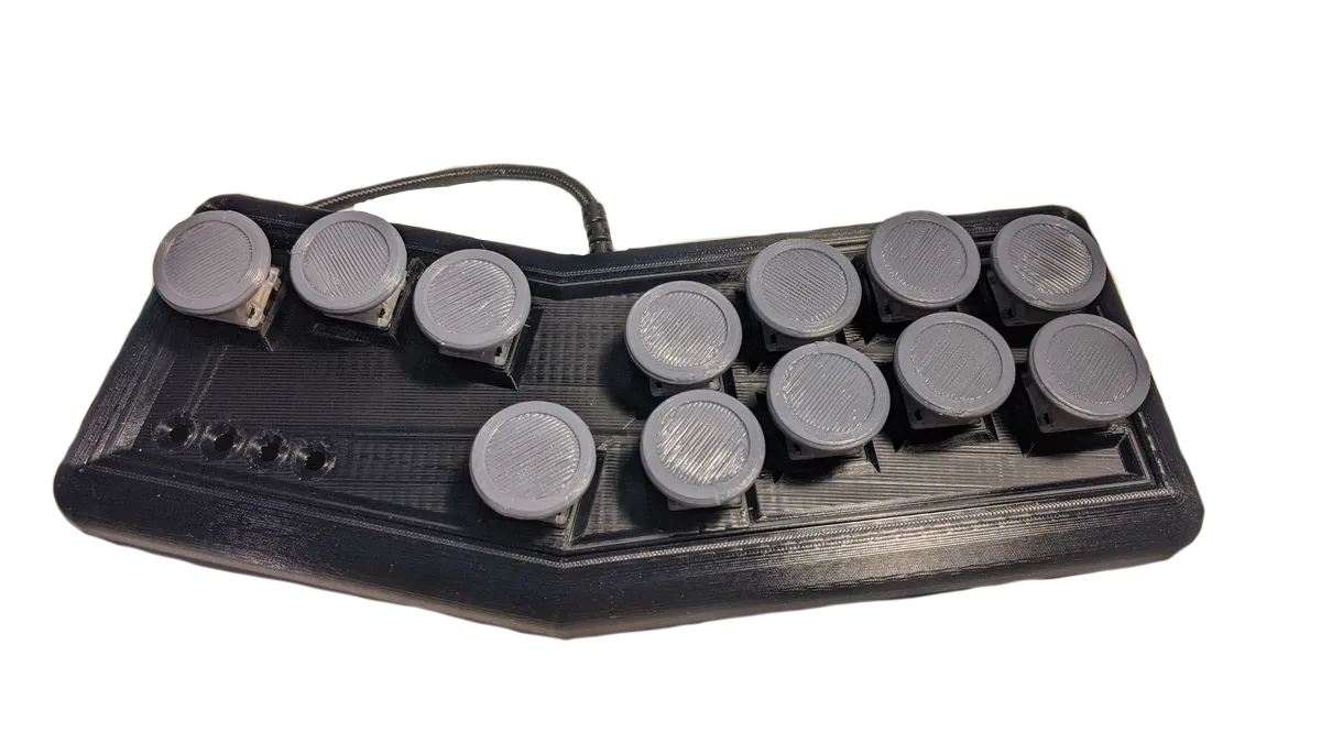 A custom black 3D-printed arcade-style controller with large gray buttons.